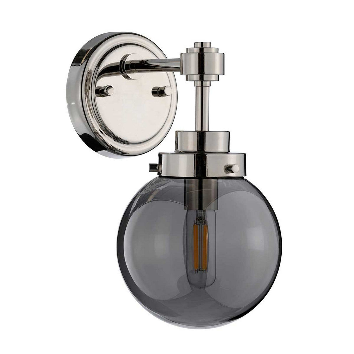 The Kula 1 Light Wall Light in polished nickel embodies a modern retro aesthetic, featuring a clear spherical glass shade that elegantly showcases a visible filament bulb. Its sleek design is enhanced by the fixture's round base.