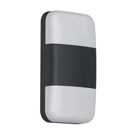 The Lars LED Outdoor Wall Light - Black is a rectangular wall-mounted LED light with rounded edges, featuring a black center stripe that divides two white sections. With an IP65 rating, this light is designed for both indoor and outdoor applications, offering a modern and sleek aesthetic for versatile lighting solutions.