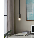 Pendant light with brushed nickel fitting holding a clear LED golf ball bulb, E14 fitting, shown glowing warm white above a desk setting.