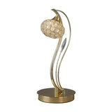 The Leimo 1 Light Crystal Table Lamp in French Gold features a gold base, curved stand, and a crystal-like spherical shade that emits a warm, inviting glow—perfect for modern interiors.