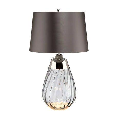 Introducing the Lena 2 Light Small Smoke Table Lamp, featuring a slate shade and a smoke-tinted glass base with elegant swirling patterns. Metallic accents elevate its sophisticated appearance, while the innovative Dual-Lit system provides versatile lighting options.