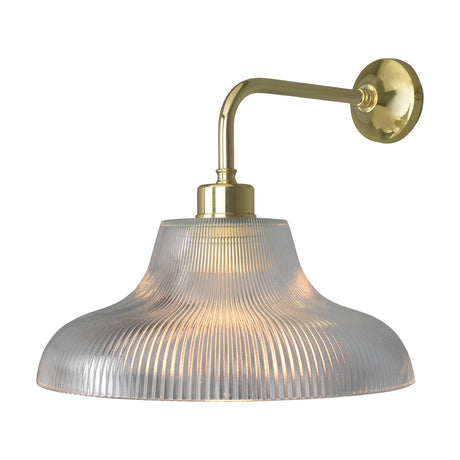 Lirosa Ribbed Glass Wall Light, 30cm, with a clear vertically ribbed glass shade on a brass wall arm and round wall plate, shown on a plain white background.