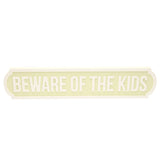 Beware of The Kids Street Sign Plaque, a rectangular wall art piece with rounded stepped ends, pale green face, white raised lettering and border, shown on a plain white background.