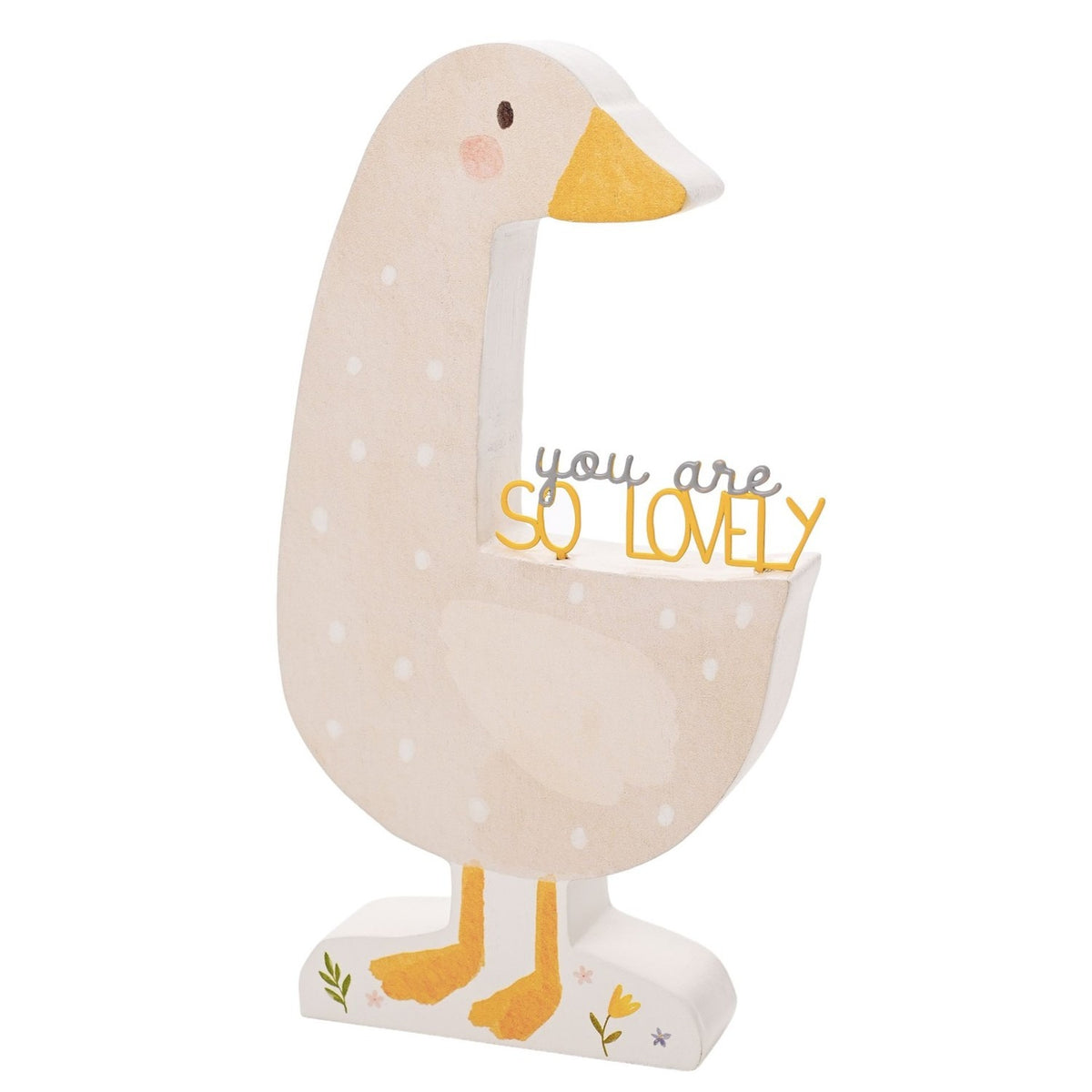Wooden goose-shaped plaque in beige with white spots, mustard yellow beak and feet, rosy cheek, and "you are SO LOVELY" lettering along its back, standing on a flat base against a white background.