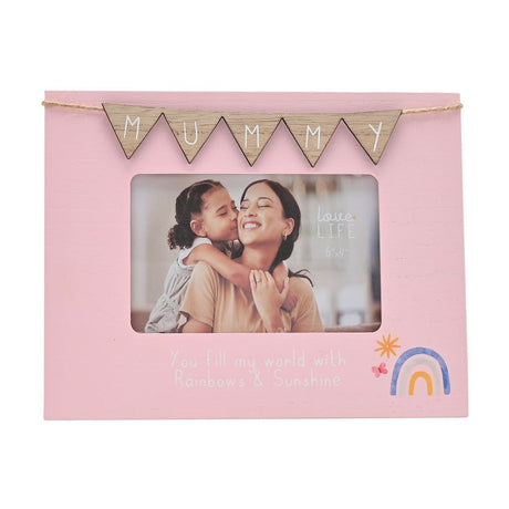 Pink wooden photo frame with wooden "MUMMY" bunting on twine, holding a 6 x 4in landscape photo, with "You fill my world with Rainbows & Sunshine" text and a rainbow motif below.