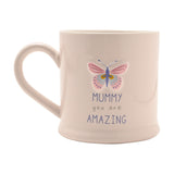 Off white stoneware mug with a C-shaped handle, featuring an embossed pastel butterfly design above "MUMMY you are AMAZING" text, shown on a plain white background.
