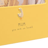 Yellow glazed stoneware photo frame for a 6 x 4in picture, with a raised goose motif above "MUM you are so loved" text, shown in close-up detail.