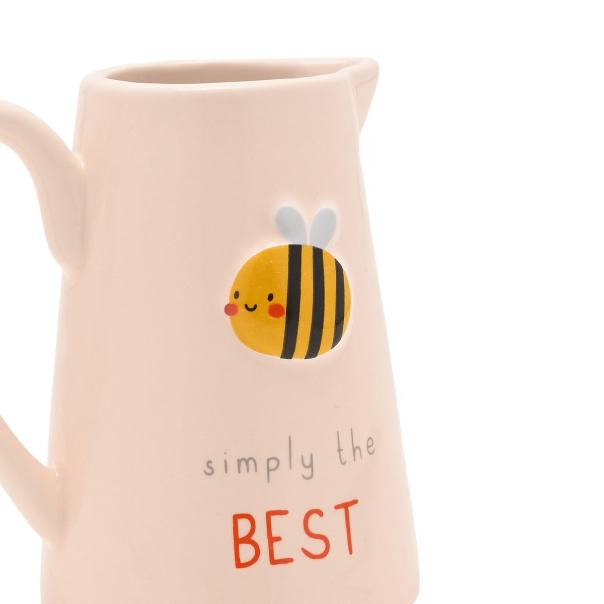 Close-up of a cream stoneware jug with a raised smiling bee design and "simply the BEST" text in grey and red lettering, shown against a white background.