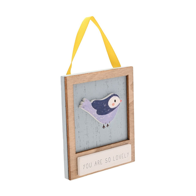 Wooden mini plaque with a raised lilac and navy bird on a weathered blue panel, "You Are So Lovely" text, natural wood frame and yellow ribbon hanger, on a white background.