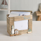 Beach Driftwood Photo Trinket Box in natural wood, lid open with photo insert, featuring a 4"x6" picture window, pebble lighthouse, tiny house with blue heart, and sea glass-sailed boat.
