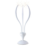 The Llamas 3 Light Table Lamp in gloss white features a modern sculptural design, standing upright on a round base. Its sleek lines and curved elements evoke elegance and sharpness, making it a stylish addition to any space.