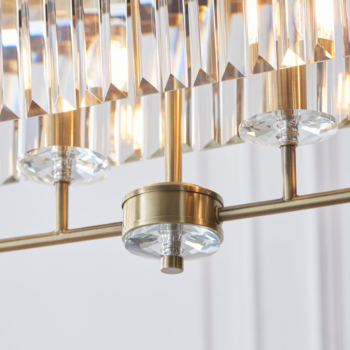 Calverdale Cut Linear 4 Light Pendant - Antique Brass