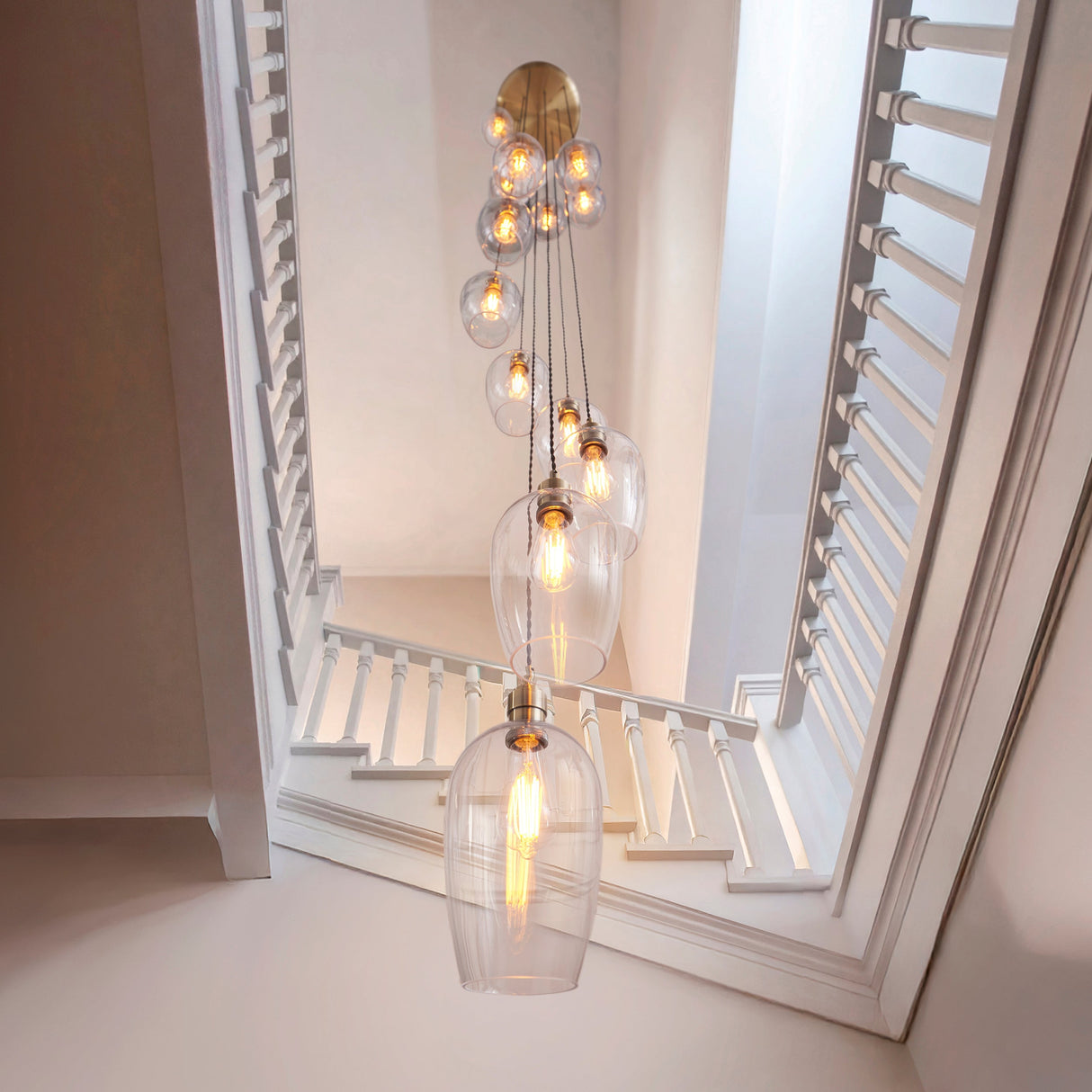 Quilbrook Cascade 13 Light Pendant - Antique Brass Clear