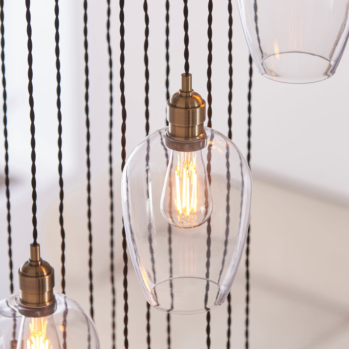 Quilbrook Cascade 13 Light Pendant - Antique Brass Clear