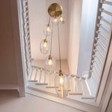Quilbrook Cascade 7 Light Pendant - Antique Brass Clear