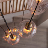 Quilbrook Cascade 7 Light Pendant - Antique Brass Clear
