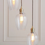 Quilbrook Cascade 7 Light Pendant - Antique Brass Clear