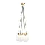 Lighting No.1 Quilbrook cluster pendant with seven clear glass globes suspended on black twisted cords from an antique brass ceiling plate.