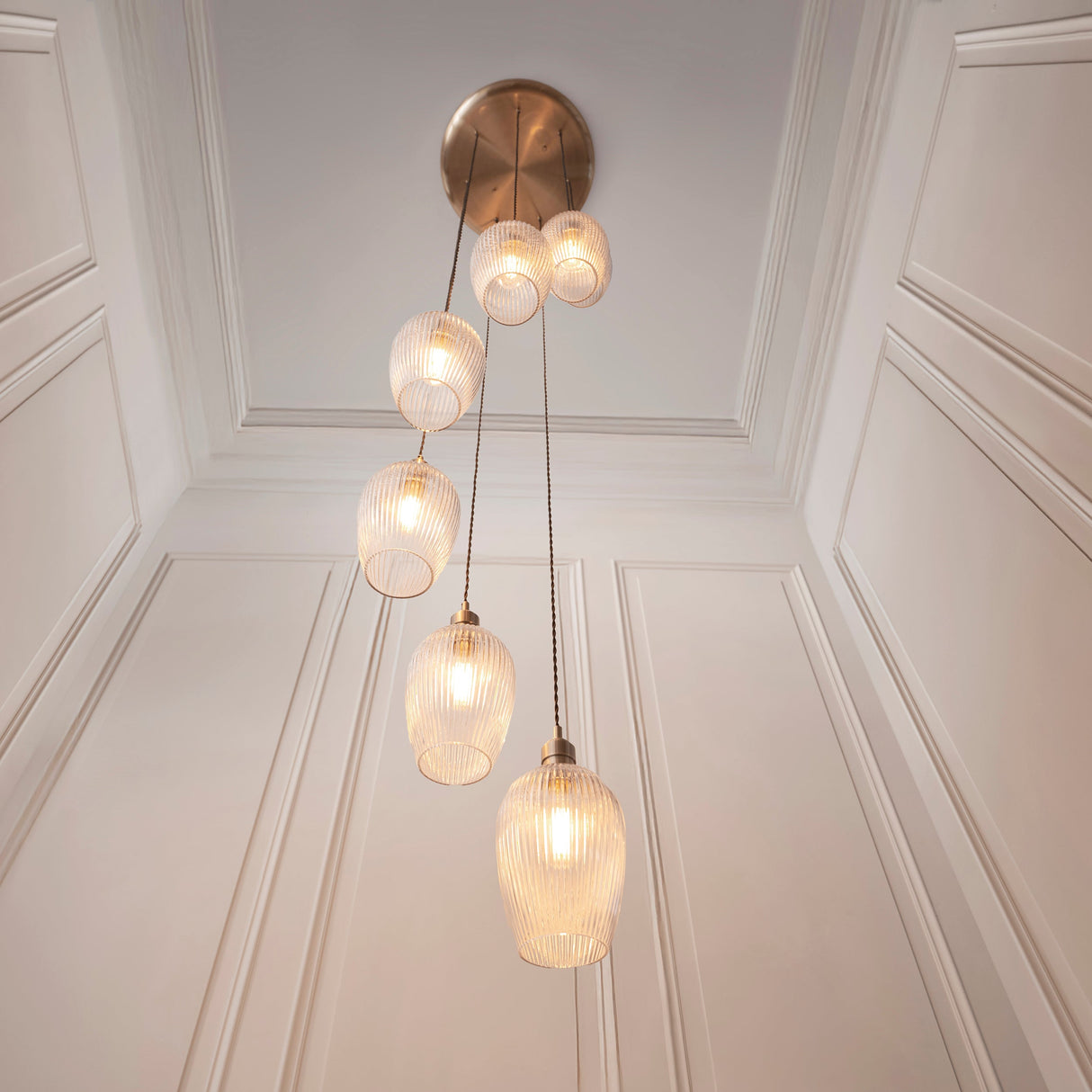 Fennhollow Ribbed Cascade 7 Light Pendant - Antique Brass Clear