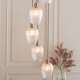 Fennhollow Ribbed Cascade 7 Light Pendant - Antique Brass Clear