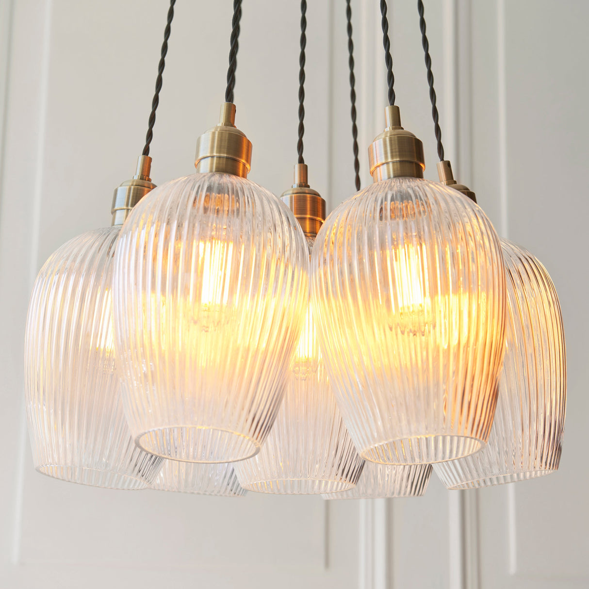 Fennhollow Ribbed Cluster 7 Light Pendant - Antique Brass Clear