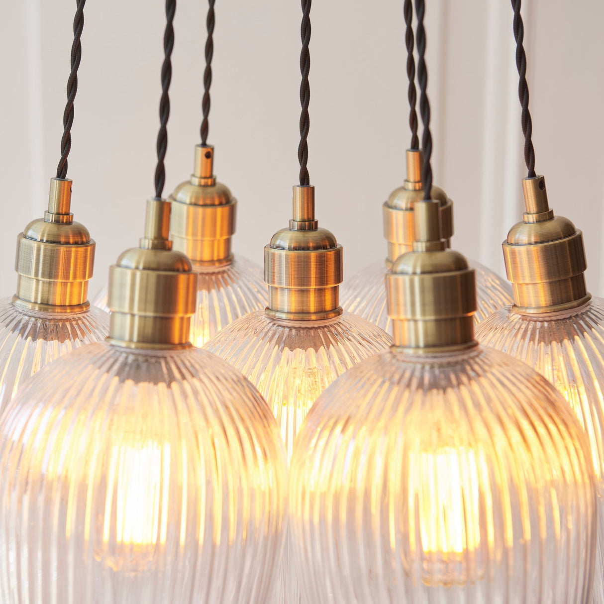 Fennhollow Ribbed Cluster 7 Light Pendant - Antique Brass Clear