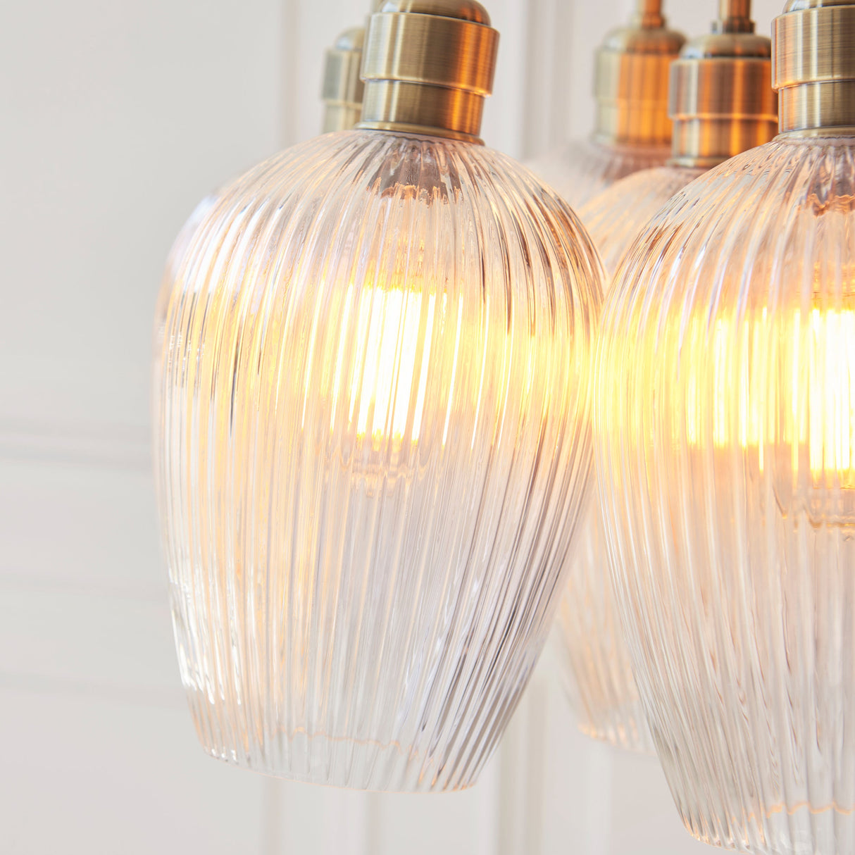 Fennhollow Ribbed Cluster 7 Light Pendant - Antique Brass Clear