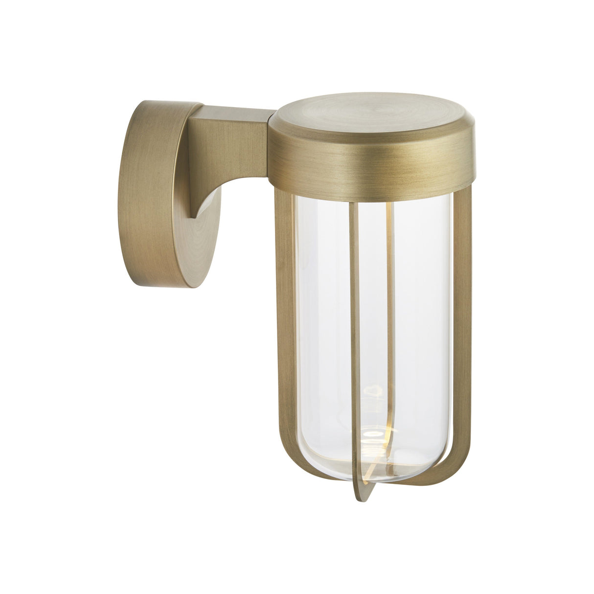 Yeldmoor die-cast LED outdoor wall light in brushed gold with a cylindrical clear glass shade and curved bracket, shown on a white background.