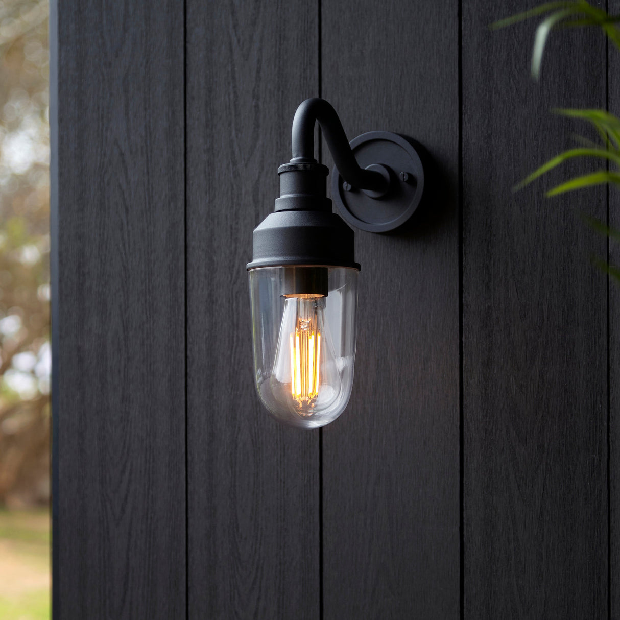 Murlwick Textured Curved Arm Outdoor Wall Light - Black Clear