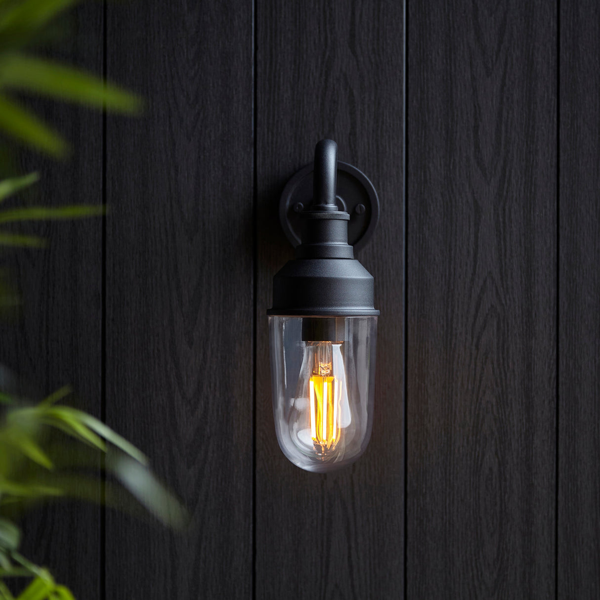 Murlwick Textured Curved Arm Outdoor Wall Light - Black Clear