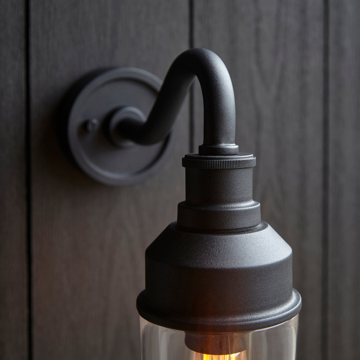 Murlwick Textured Curved Arm Outdoor Wall Light - Black Clear