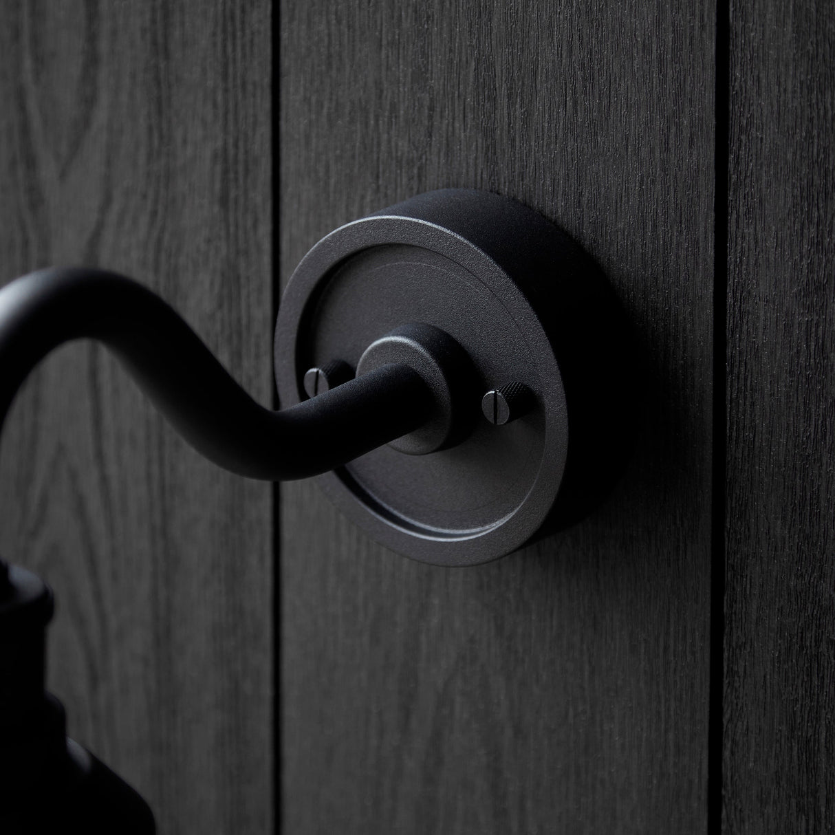 Murlwick Textured Curved Arm Outdoor Wall Light - Black Clear