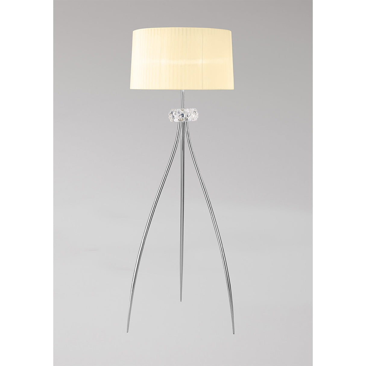 The Loewe 3 Light Floor Lamp features a cream cylindrical shade, a clear glass accent near the top, and three slender chrome legs, shown against a plain light gray background.