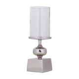 Longnah Candle Holder in polished silver aluminium with a square base, bulb-shaped stem, and clear glass cylinder, shown on a plain white background.