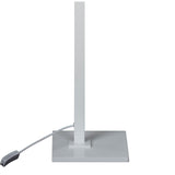 The Looker 1 Light Wood Floor Lamp in matt white features a minimalist, Scandinavian-inspired rectangular design with a flat square base, upright stem, and visible power cord.