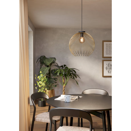 Losmora Pendant Light 40cm in black and gold, a round globe shade of fine wire strips on a black cord, hung above a dining table in a grey-toned dining room.