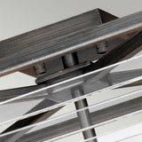 Close-up view of the Louvre 4 Light Flush ceiling fan mount, featuring a graphite finish and multiple blades. The flush fitting mechanism is visible, highlighting the textured hardware and sleek design against a soft background.