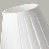 A close-up of the Clip Shades Pleated White Candle Shade, crafted from polycotton fabric, against a plain background highlights its simple and elegant design, making it a timeless addition to any lighting fixture.