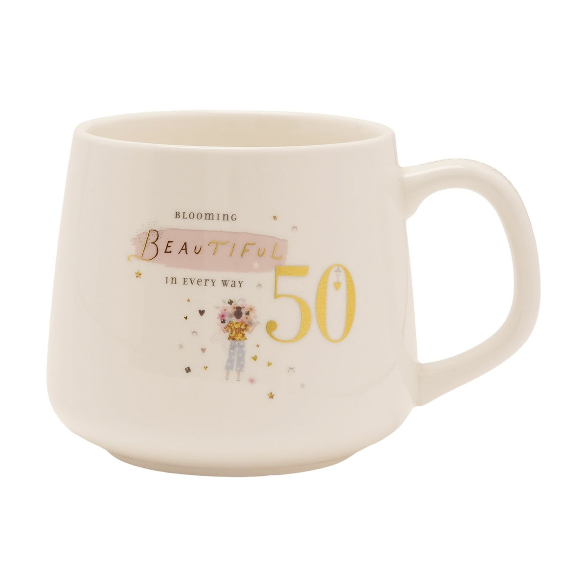 White stoneware birthday mug with gold "50" and "Blooming Beautiful" text, pink brushstroke accent, and an illustrated flower-holding figure with hearts, shown on a plain white background.