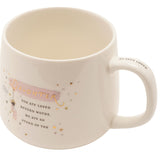 White stoneware mug with "Daughter" in gold script on a pink banner, "You are loved beyond words" text, swing figure and gold star details, on a white background.