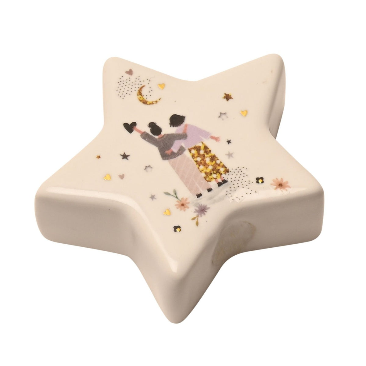 White ceramic star-shaped keepsake token featuring two figures arm in arm beneath a crescent moon, with hearts, stars and florals, set on a plain white background.