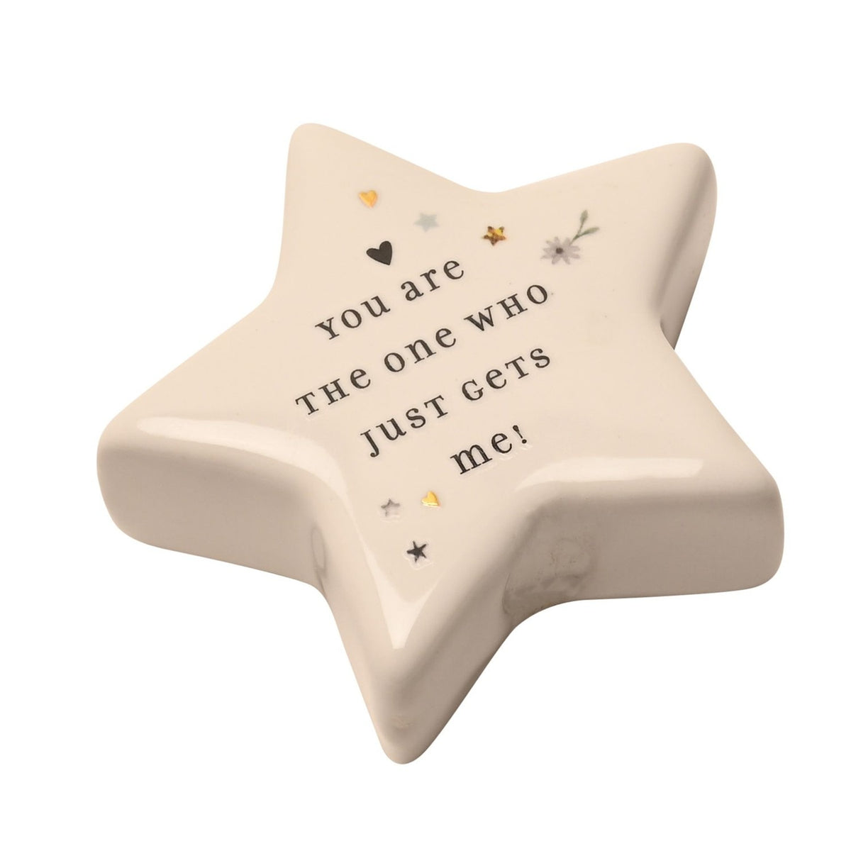 White ceramic star keepsake token with glossy finish, printed with "You are the one who just gets me!" and small heart, star, and flower motifs, on a plain white background.