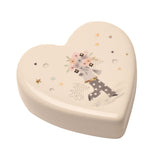 Cream ceramic heart-shaped keepsake token with a floral bouquet figure design, gold stars and hearts scattered around, glossy glaze finish, shown on a plain white background.