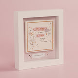 White box frame plaque with raised ceramic tile reading Mummy you have loved me for as long as I have lived, featuring geese, stars, moon and clouds on pink background, Love you always below.