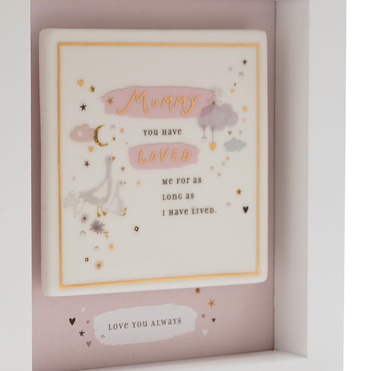Wooden boxed wall plaque in white and pink with "Mummy, you have loved me for as long as I have lived" text, geese, moon, clouds, stars and hearts, framed in white.