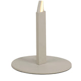 A close-up of the Madagascar LED Floor Lamp 24W 3000K in Sand White, featuring a modern sculptural base with a flat circular bottom and a rectangular vertical stand in a light beige hue.