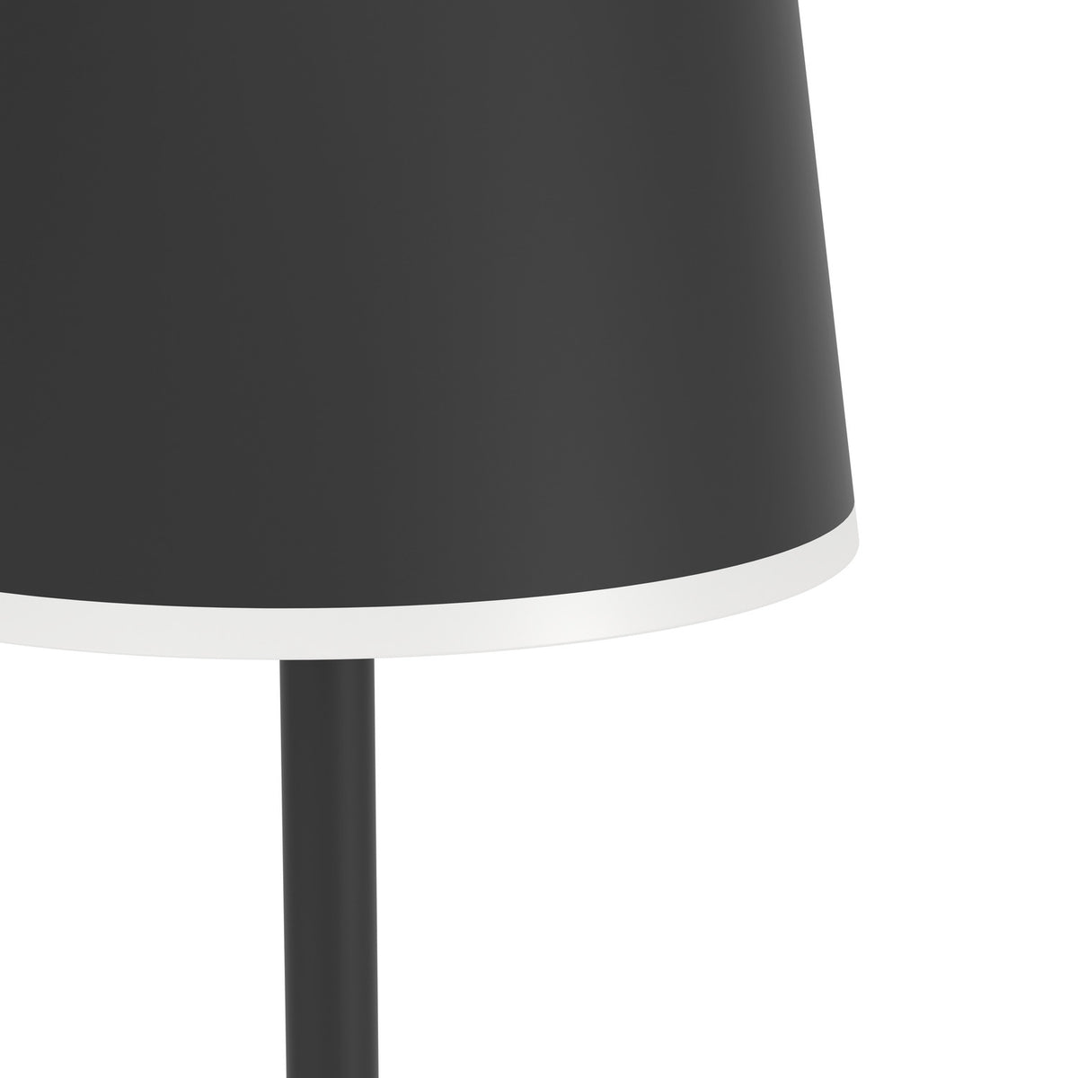 Close-up of the Mannera-L LED floor lamp in black, showing the tapered aluminium shade with a white diffuser edge above the slender black stem, set against a plain white background.