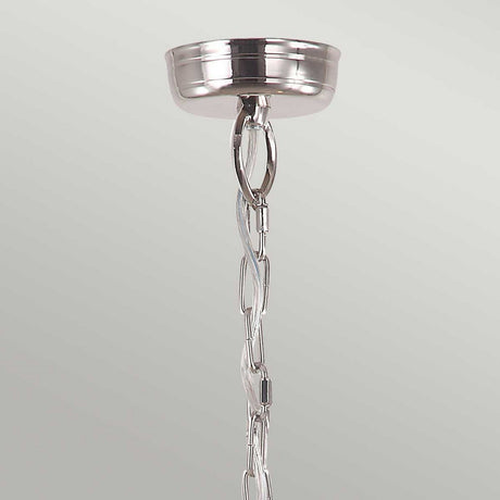 A detailed view of the Mansion 3 Light Outdoor Chain Pendant in polished nickel, featuring a decorative chain with an intricate twisted design reminiscent of a solid brass lantern. The backdrop is a simple light gray color.