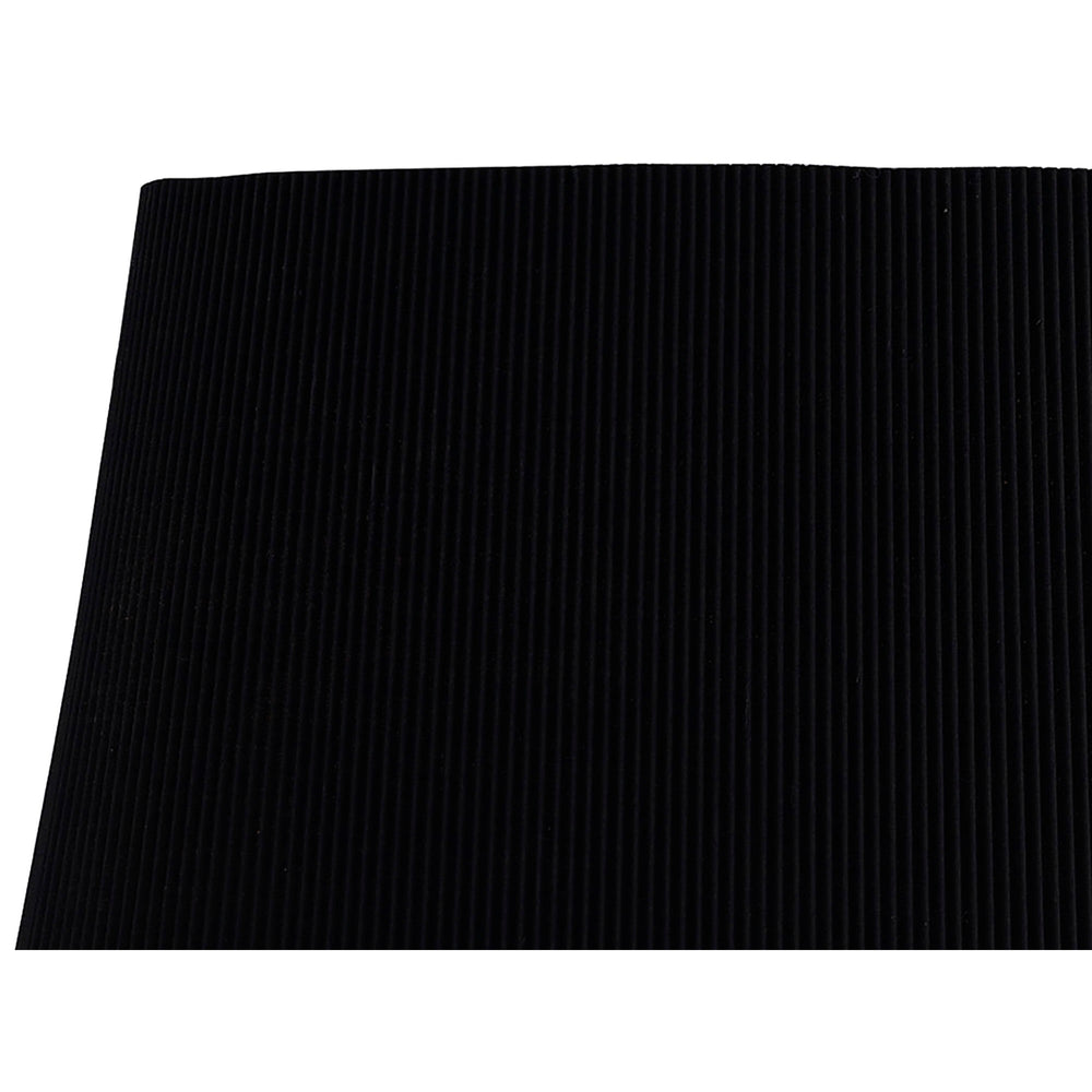 Close-up of the Mara wall light's black pleated fabric shade showing the vertical ribbed texture against a plain white background.