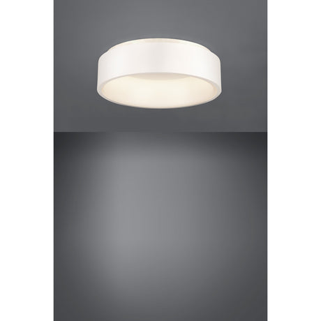 Marghera 1 LED flush ceiling light, 45cm round white drum design with recessed diffuser, shown illuminated against a grey background.